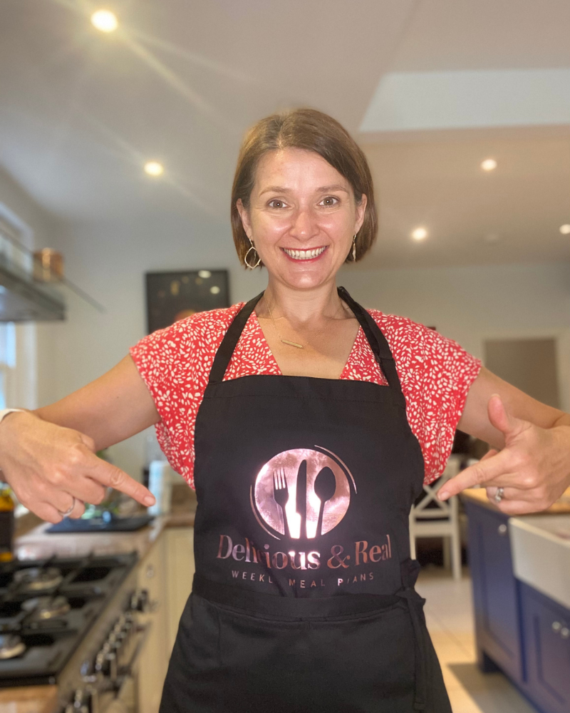 Image of Claire with Delicious & Real Apron.